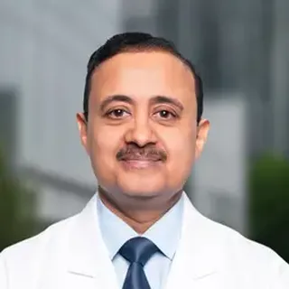 Dr. George Cherian